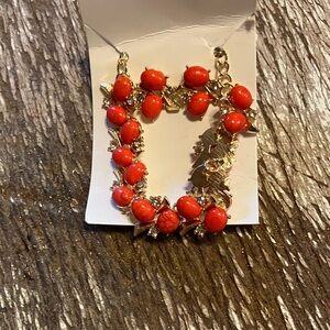 Red & white bracelet and earrings in goldtone